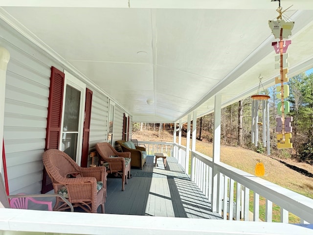 wooden terrace featuring a porch