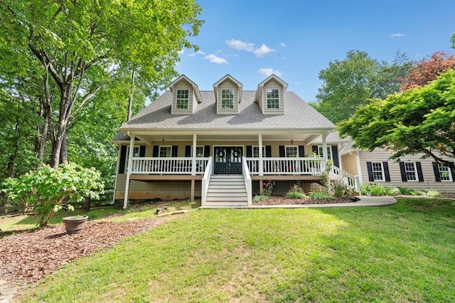 cape cod home with a porch and a front yard