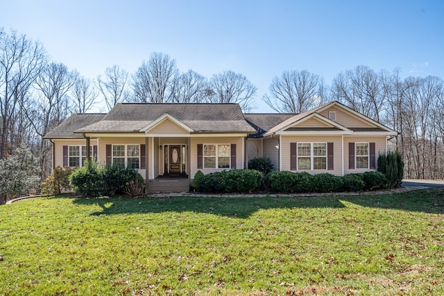 single story home with a front yard and a porch