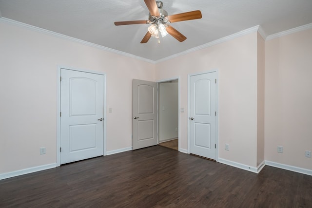 unfurnished bedroom featuring ceiling fan, ornamental molding, and dark hardwood / wood-style flooring