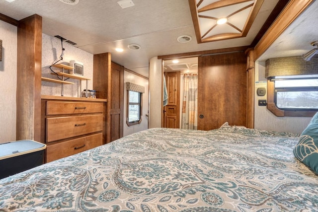 bedroom featuring a textured ceiling