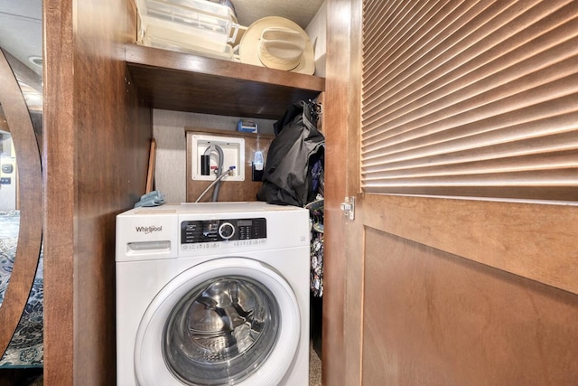 laundry room with washer / dryer