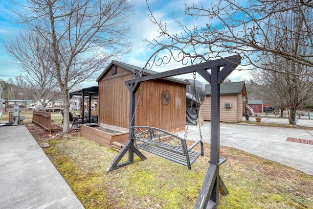 view of home's exterior featuring an outbuilding