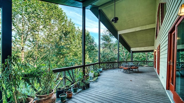 wooden deck with outdoor dining space