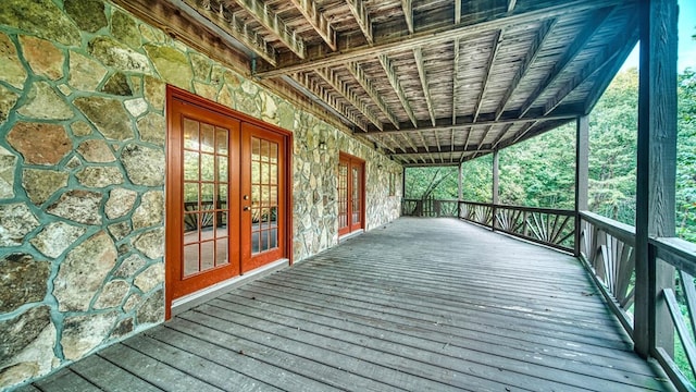 wooden deck featuring french doors