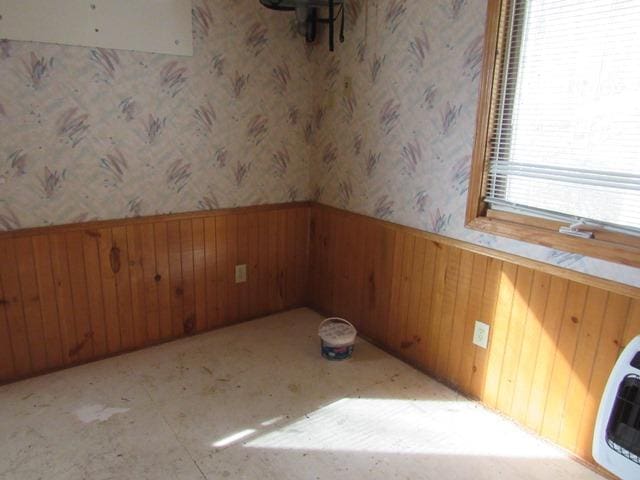 empty room with wooden walls