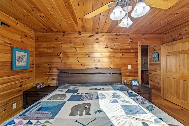 bedroom with wooden ceiling, wood walls, and wood finished floors