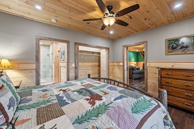 bedroom featuring wooden ceiling, a wainscoted wall, and wooden walls