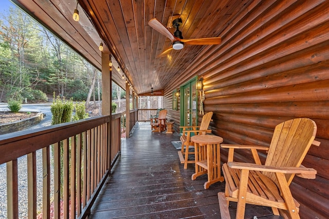 wooden deck with ceiling fan