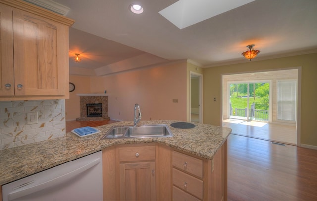 467 Greenlawn Cemetary Rd, Murphy, NC 28906 - kitchen featuring dishwasher, a sink, open floor plan, a peninsula, and a fireplace with raised hearth