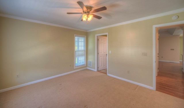 467 Greenlawn Cemetary Rd, Murphy, NC 28906 - spare room featuring a ceiling fan, light colored carpet, baseboards, ornamental molding, and a smoke detector
