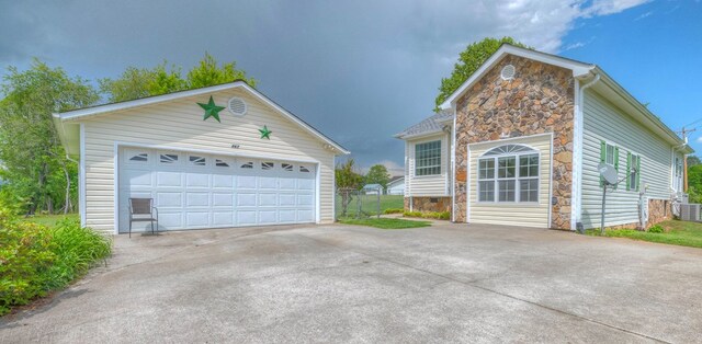 467 Greenlawn Cemetary Rd, Murphy, NC 28906 - ranch-style home with stone siding, an outdoor structure, and a detached garage