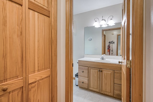 bathroom featuring tile patterned floors and vanity