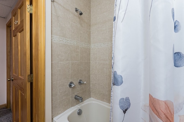 full bath with shower / bath combination with curtain