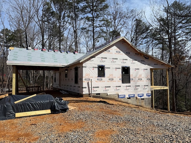 view of property exterior with crawl space