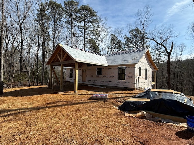 view of side of home featuring crawl space