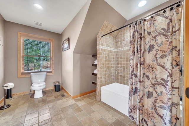 bathroom featuring tile floors and toilet