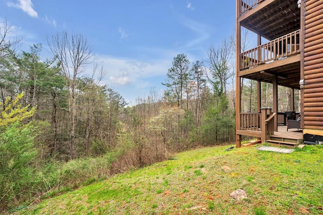 view of yard with a deck