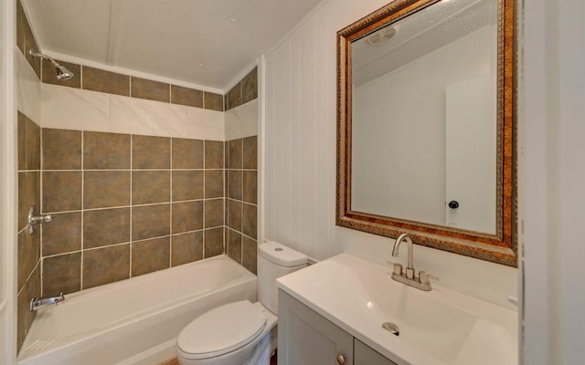 bathroom featuring toilet, shower / washtub combination, and vanity