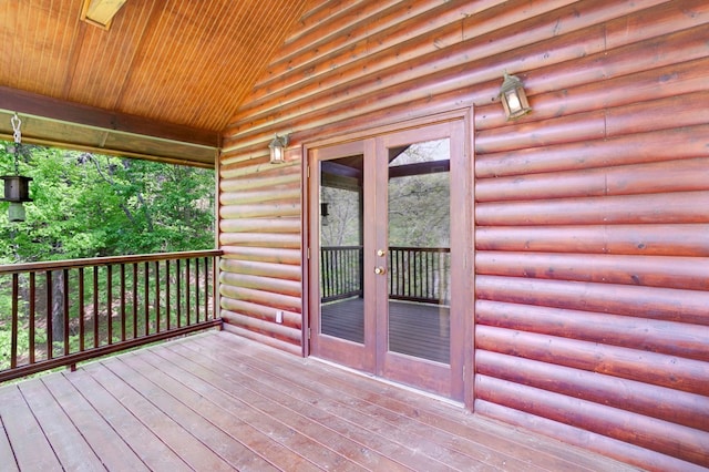 wooden deck featuring french doors