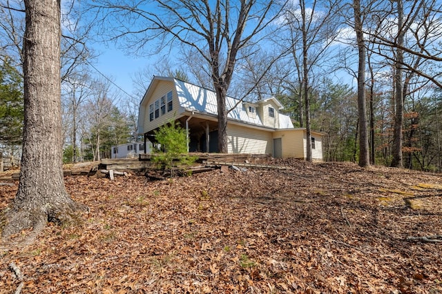 view of front of home with a deck