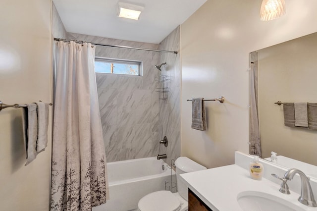 full bathroom with vanity, shower / bath combo, and toilet