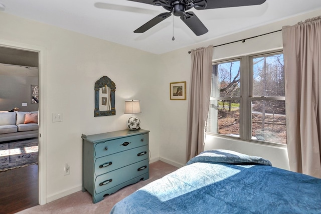 bedroom featuring carpet flooring and ceiling fan