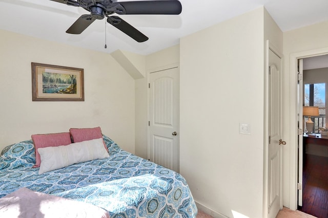 bedroom featuring hardwood / wood-style floors and ceiling fan