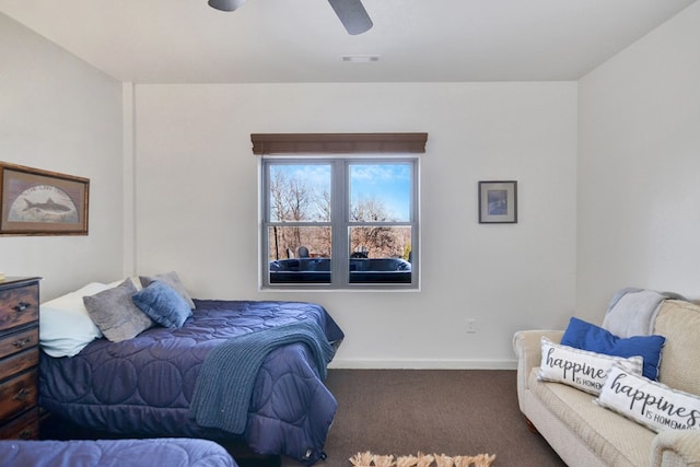 bedroom with ceiling fan and carpet