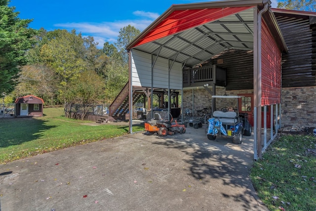 view of parking with a yard