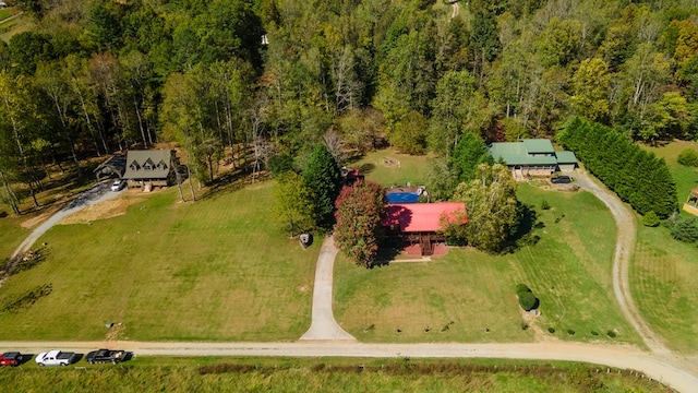 birds eye view of property with a rural view