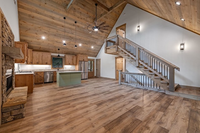 74 Cohutta Overlook Way, Blue Ridge, GA 30513 - kitchen with high vaulted ceiling, wood ceiling, stainless steel appliances, light wood-type flooring, and light countertops