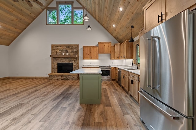 74 Cohutta Overlook Way, Blue Ridge, GA 30513 - kitchen featuring appliances with stainless steel finishes, a sink, high vaulted ceiling, a kitchen island, and light wood-type flooring