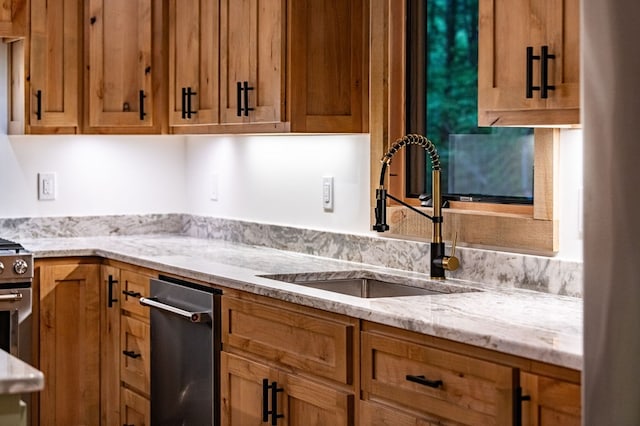 74 Cohutta Overlook Way, Blue Ridge, GA 30513 - kitchen featuring a sink, light stone countertops, and brown cabinetry