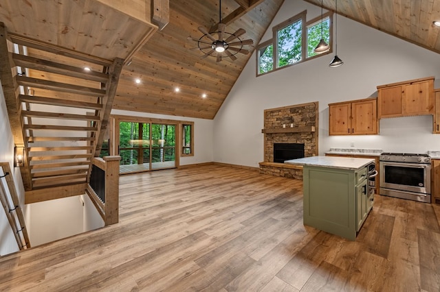 74 Cohutta Overlook Way, Blue Ridge, GA 30513 - kitchen featuring high end range, wooden ceiling, high vaulted ceiling, open floor plan, and light countertops