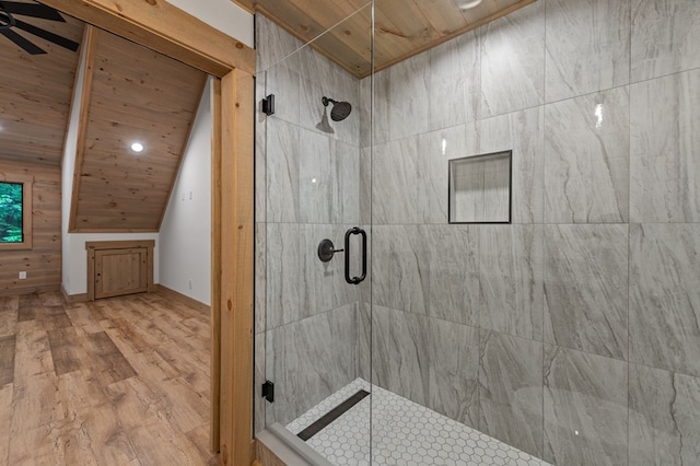 74 Cohutta Overlook Way, Blue Ridge, GA 30513 - bathroom with a stall shower, wood ceiling, wood finished floors, vaulted ceiling, and ceiling fan