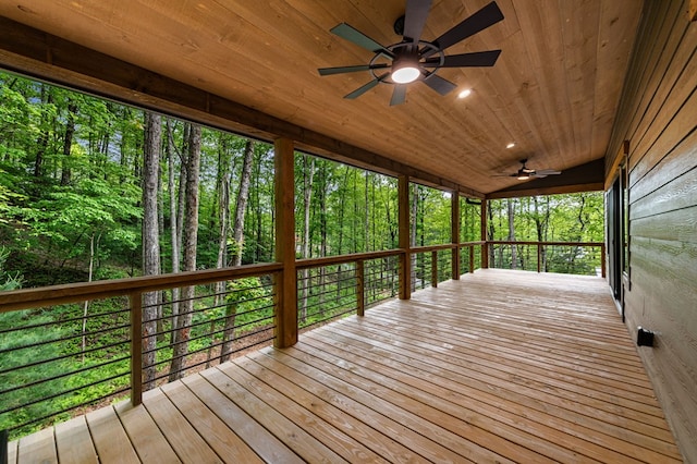 74 Cohutta Overlook Way, Blue Ridge, GA 30513 - wooden deck with a ceiling fan and a wooded view