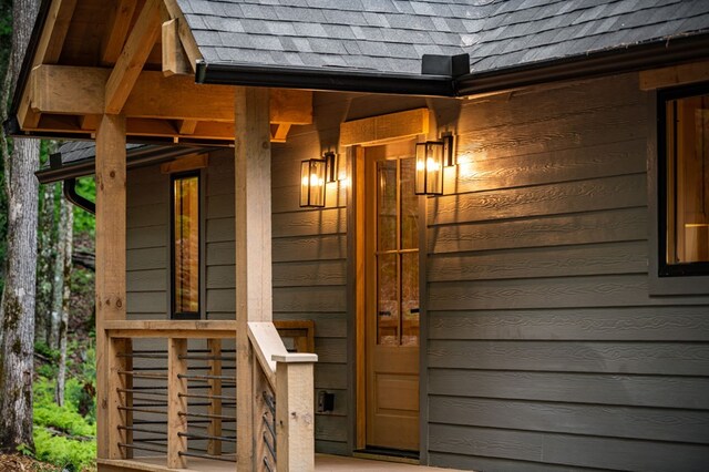 74 Cohutta Overlook Way, Blue Ridge, GA 30513 - property entrance featuring a shingled roof and covered porch