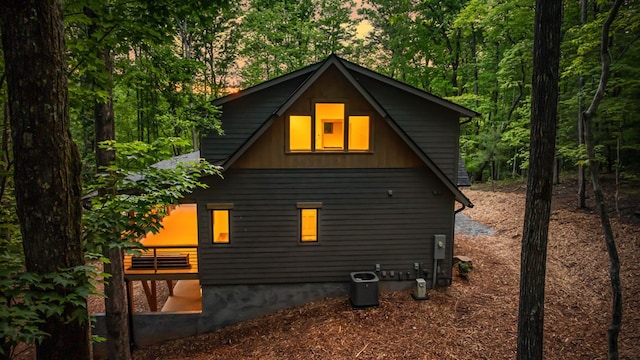 74 Cohutta Overlook Way, Blue Ridge, GA 30513 - view of side of home with cooling unit and board and batten siding