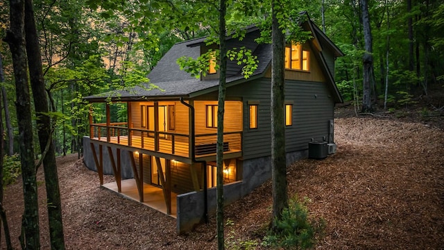 74 Cohutta Overlook Way, Blue Ridge, GA 30513 - rear view of property with a shingled roof, a deck, central air condition unit, and a patio