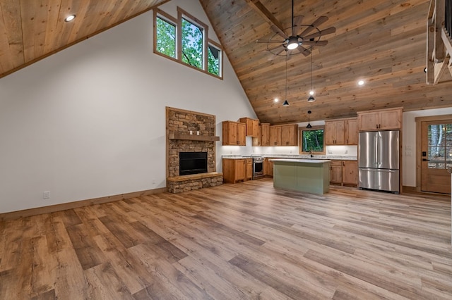 74 Cohutta Overlook Way, Blue Ridge, GA 30513 - kitchen featuring stainless steel appliances, high vaulted ceiling, light countertops, open floor plan, and wood ceiling