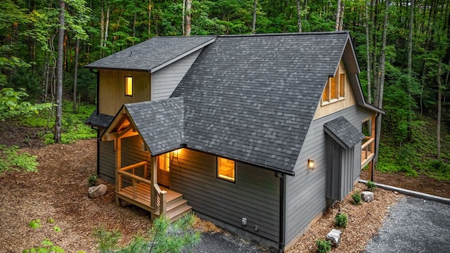 74 Cohutta Overlook Way, Blue Ridge, GA 30513 - view of property exterior featuring a wooded view and a shingled roof