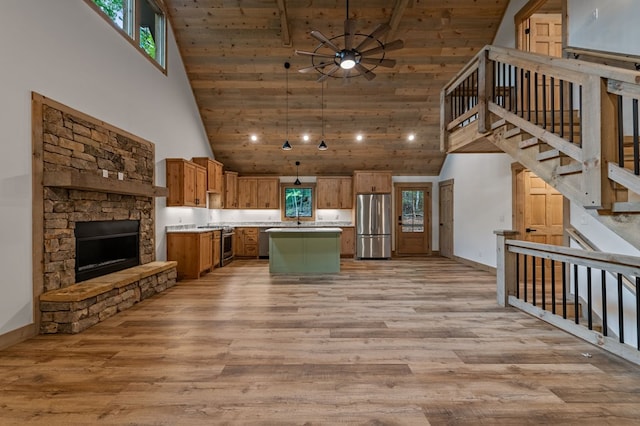 74 Cohutta Overlook Way, Blue Ridge, GA 30513 - kitchen with stainless steel appliances, high vaulted ceiling, light wood-style flooring, light countertops, and wooden ceiling