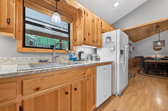 191 Deer Run Rd, Blairsville, GA 30512 - kitchen featuring white appliances, vaulted ceiling, light wood-type flooring, hanging light fixtures, and light stone countertops
