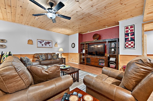 191 Deer Run Rd, Blairsville, GA 30512 - living area with wood ceiling, wood finished floors, wainscoting, ceiling fan, and crown molding