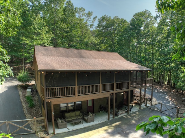 191 Deer Run Rd, Blairsville, GA 30512 - view of front of property featuring a patio, roof with shingles, an outdoor living space, and a gate