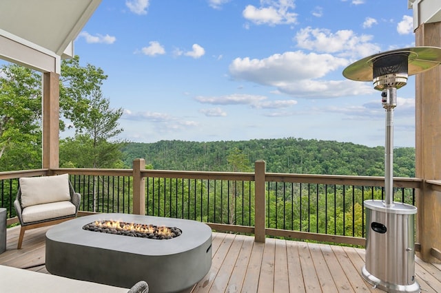497 S Jakes Landing Way, Ellijay, GA 30540 - wooden terrace with a fire pit and a wooded view