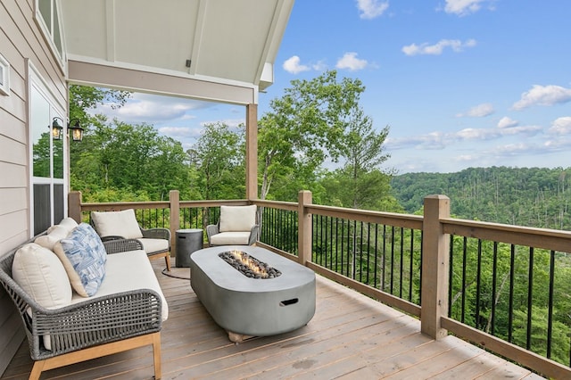 497 S Jakes Landing Way, Ellijay, GA 30540 - deck with an outdoor fire pit and a view of trees