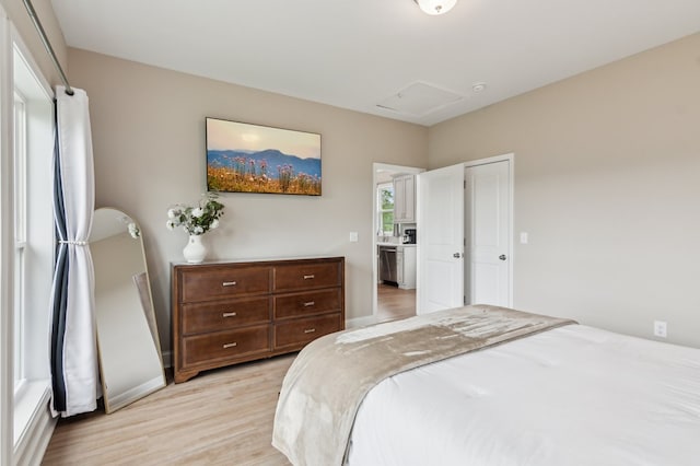 497 S Jakes Landing Way, Ellijay, GA 30540 - bedroom featuring attic access, light wood-style floors, and baseboards