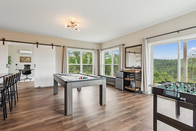 497 S Jakes Landing Way, Ellijay, GA 30540 - playroom featuring a barn door, healthy amount of natural light, and dark wood-style flooring